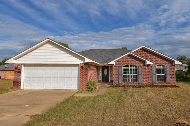 ranch-style home with a garage and a front yard