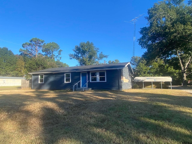 ranch-style home with a front lawn