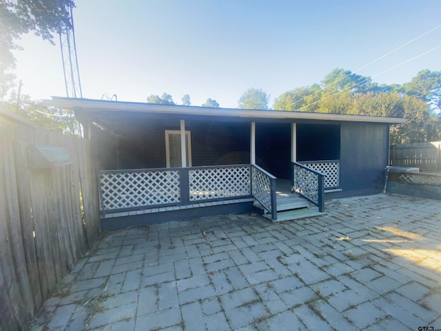 rear view of house with a patio area