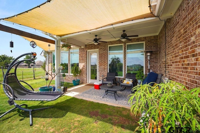 view of patio featuring a ceiling fan