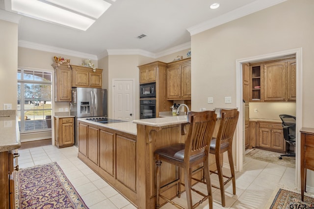 kitchen featuring kitchen peninsula, light tile patterned flooring, crown molding, and black appliances