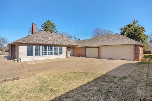 single story home featuring a garage