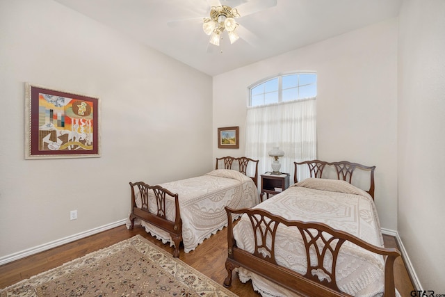 bedroom featuring hardwood / wood-style floors and ceiling fan