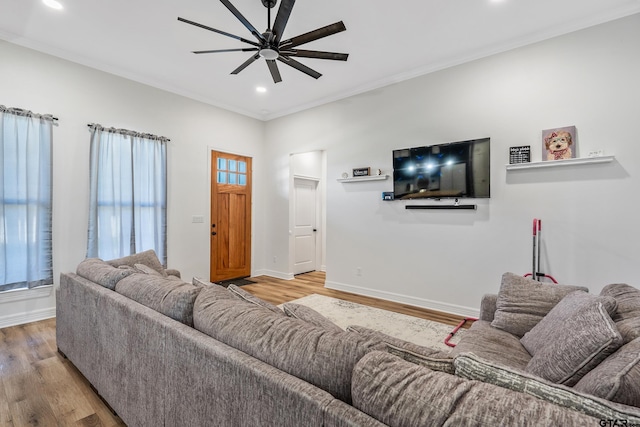 519 Crystal Ave, Rusk, TX 75785 - living area with wood finished floors, ceiling fan, baseboards, recessed lighting, and crown molding