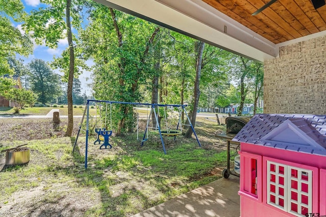 519 Crystal Ave, Rusk, TX 75785 - view of yard featuring a playground and view of wooded area