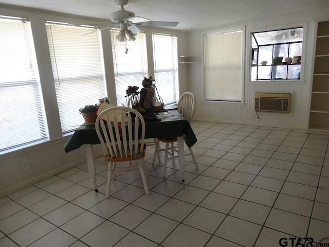 dining space featuring ceiling fan, light tile patterned floors, and a wealth of natural light