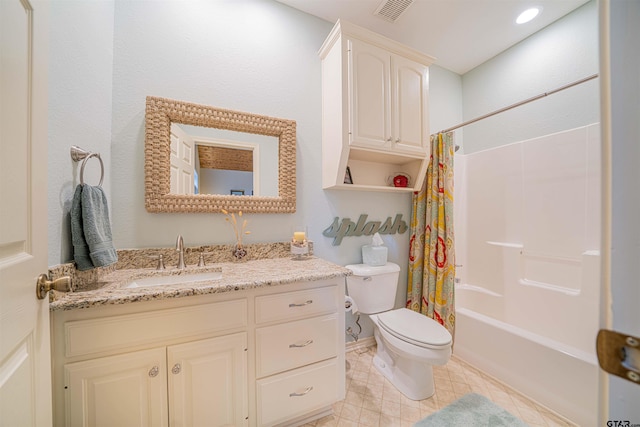 full bathroom with vanity, shower / bath combination with curtain, and toilet