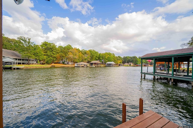 dock area featuring a water view