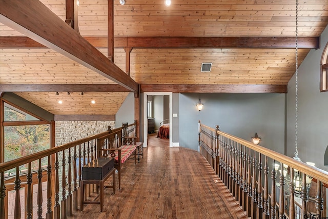 hall with beam ceiling, hardwood / wood-style floors, wood ceiling, and high vaulted ceiling