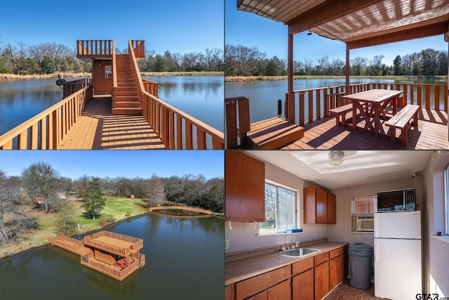 view of dock featuring a water view and sink