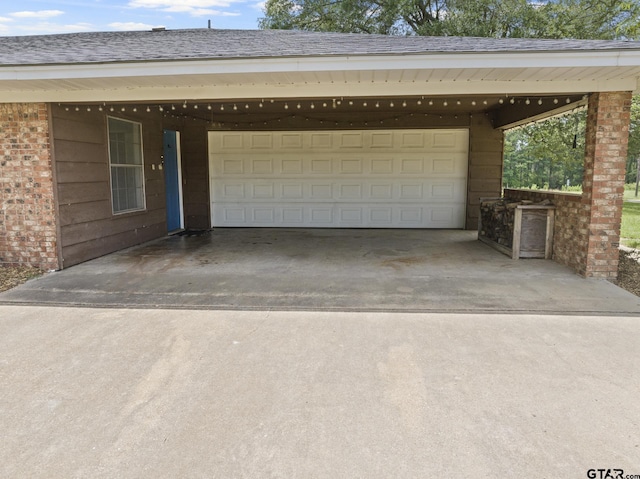 garage with a carport