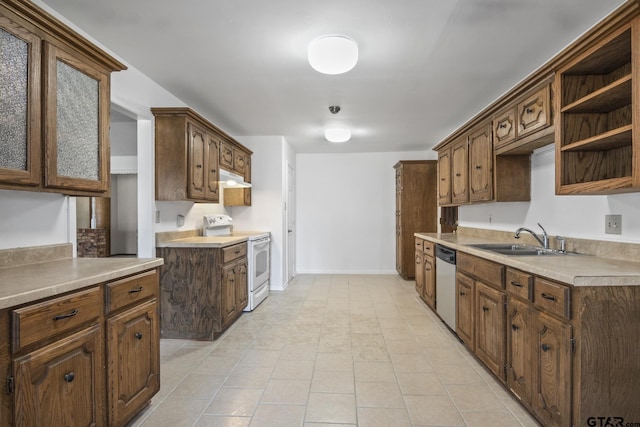 kitchen with white range with electric cooktop, sink, stainless steel dishwasher, dark brown cabinets, and light tile patterned floors