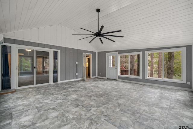 381 Winding Trl, Holly Lake Ranch, TX 75765 - unfurnished sunroom featuring vaulted ceiling, healthy amount of natural light, and a wall mounted air conditioner