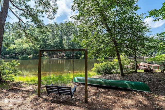 381 Winding Trl, Holly Lake Ranch, TX 75765 - view of yard with a water view
