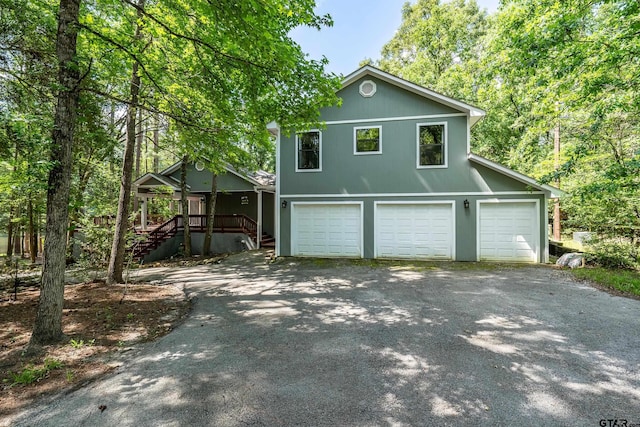 381 Winding Trl, Holly Lake Ranch, TX 75765 - view of front of property with stairway and driveway