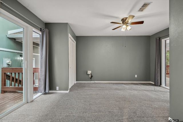 381 Winding Trl, Holly Lake Ranch, TX 75765 - carpeted spare room featuring ceiling fan and baseboards