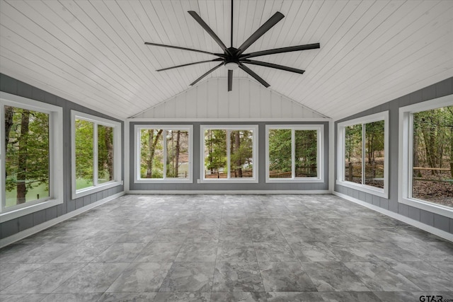 381 Winding Trl, Holly Lake Ranch, TX 75765 - unfurnished sunroom with vaulted ceiling, healthy amount of natural light, baseboards, and wood walls