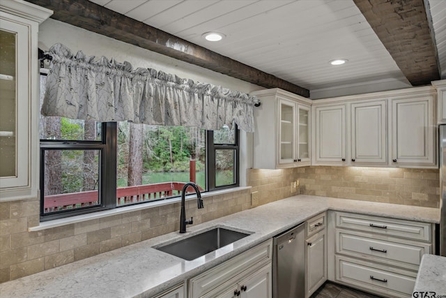 381 Winding Trl, Holly Lake Ranch, TX 75765 - kitchen with stainless steel dishwasher, a sink, wooden ceiling with exposed beams, light stone counters, and decorative backsplash