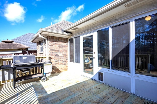 deck featuring grilling area