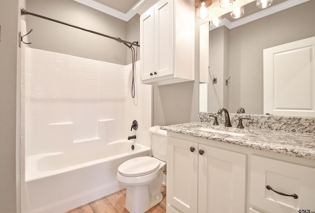 full bathroom featuring wood-type flooring, vanity,  shower combination, toilet, and crown molding