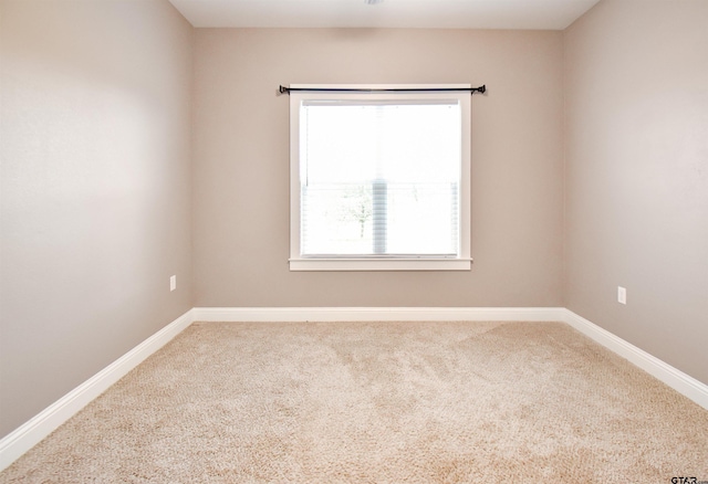 view of carpeted spare room