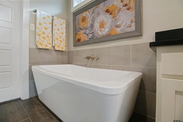 2946 Guinn Farms Rd, Tyler, TX 75707 - full bath with tile walls and a freestanding tub