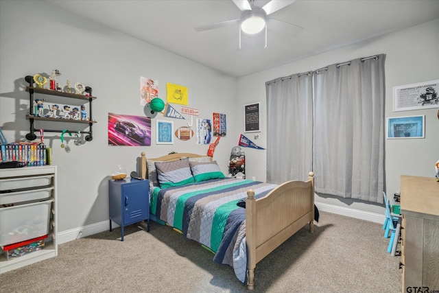 bedroom with baseboards, carpet, and a ceiling fan