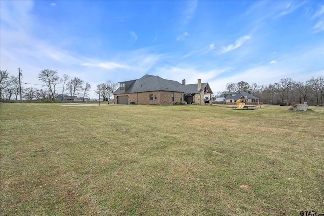 view of yard with an attached garage