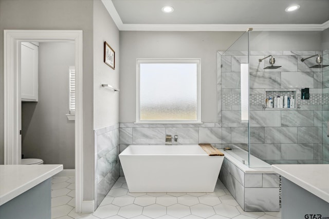 full bathroom featuring vanity, a soaking tub, a stall shower, ornamental molding, and tile walls