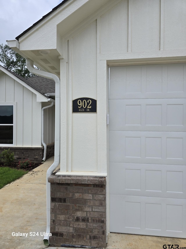 exterior details with board and batten siding and brick siding