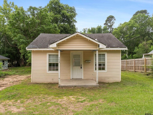 509 Clark St, Gilmer, TX 75644 - bungalow-style home with a shingled roof
