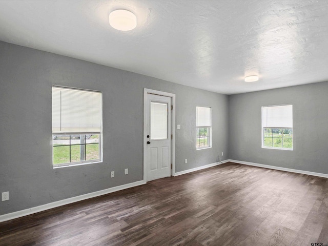509 Clark St, Gilmer, TX 75644 - empty room featuring dark wood finished floors