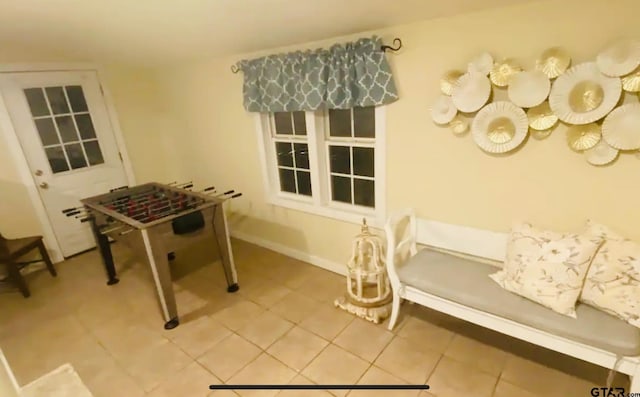 102 Indianola Rd, Chandler, TX 75758 - playroom with light tile patterned floors and baseboards