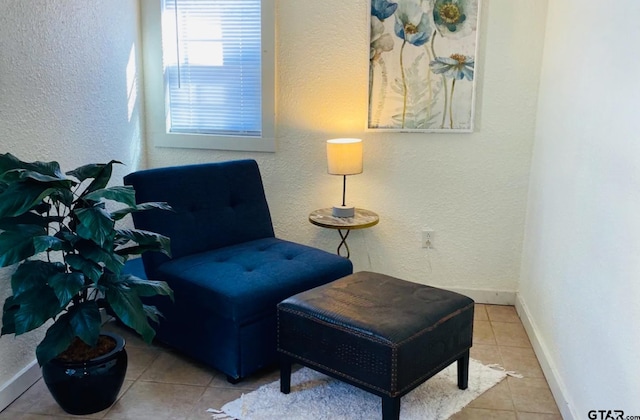 sitting room with light tile patterned flooring