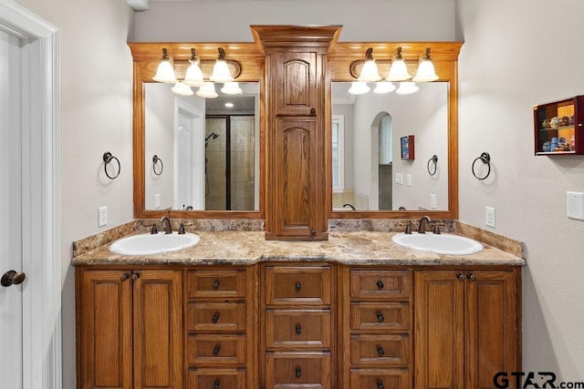 2322 Kingsmill Cir, Tyler, TX 75703 - full bathroom featuring a shower stall and double vanity