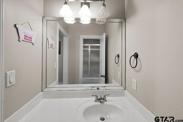 2322 Kingsmill Cir, Tyler, TX 75703 - bathroom with vanity and a textured wall
