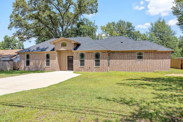 1720 Outer Dr, Tyler, TX 75701 - single story home with brick siding, concrete driveway, and a shingled roof