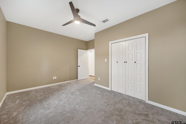 1720 Outer Dr, Tyler, TX 75701 - unfurnished bedroom featuring carpet floors, a closet, and a ceiling fan