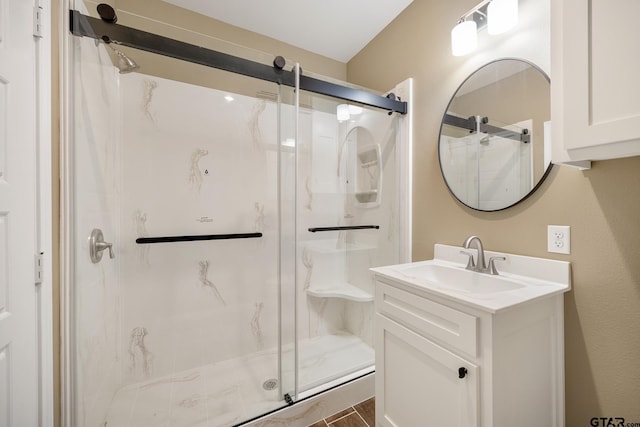 1720 Outer Dr, Tyler, TX 75701 - bathroom with a marble finish shower and vanity