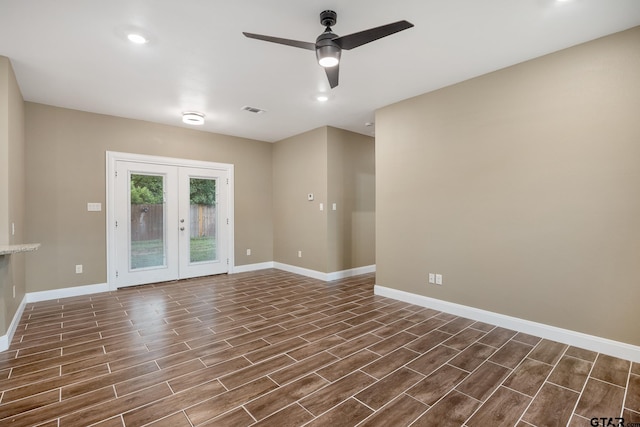 1720 Outer Dr, Tyler, TX 75701 - spare room featuring wood finish floors, a ceiling fan, french doors, and recessed lighting