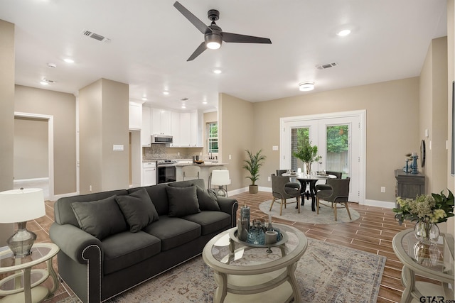 1720 Outer Dr, Tyler, TX 75701 - living area with ceiling fan, recessed lighting, and wood finished floors