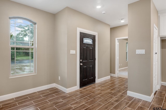 1720 Outer Dr, Tyler, TX 75701 - entryway featuring wood tiled floors and recessed lighting