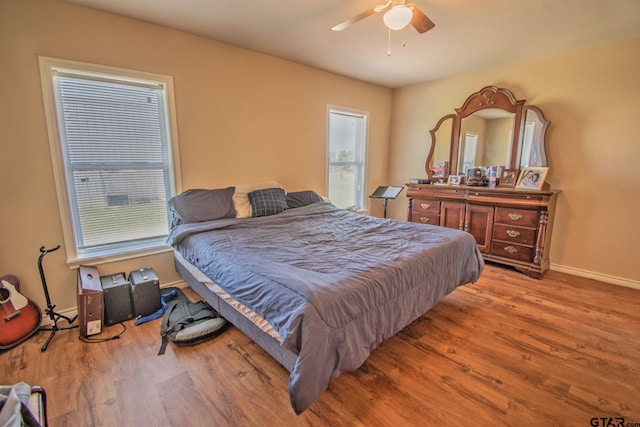 17215 Tartlon Rd, Mabank, TX 75147 - bedroom with wood finished floors and ceiling fan
