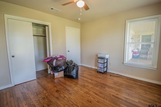 17215 Tartlon Rd, Mabank, TX 75147 - unfurnished bedroom with wood finished floors, a closet, and ceiling fan