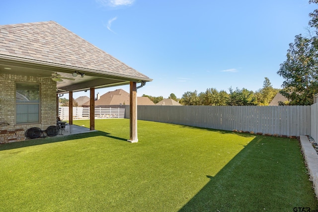 view of yard with a patio area