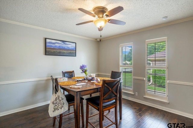 1216 Kingspark Dr, Tyler, TX 75703 - dining space with baseboards, ceiling fan, a textured ceiling, and hardwood / wood-style flooring