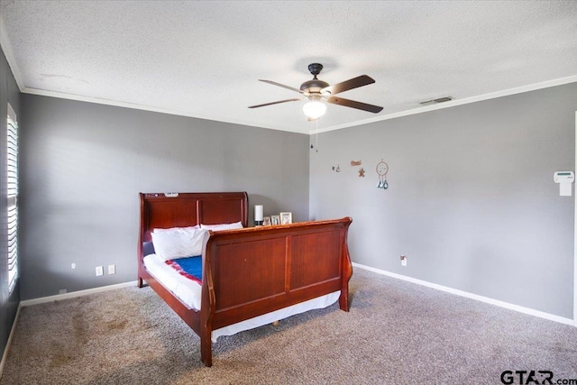 1216 Kingspark Dr, Tyler, TX 75703 - carpeted bedroom with crown molding, a textured ceiling, baseboards, and visible vents