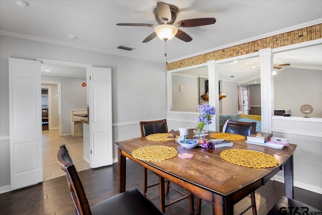 1216 Kingspark Dr, Tyler, TX 75703 - dining room with hardwood / wood-style floors, a ceiling fan, visible vents, and ornate columns