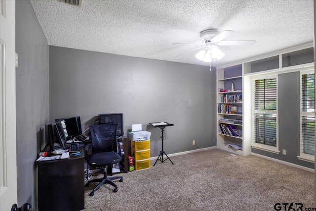 1216 Kingspark Dr, Tyler, TX 75703 - office space with a textured ceiling, carpet floors, a ceiling fan, and baseboards