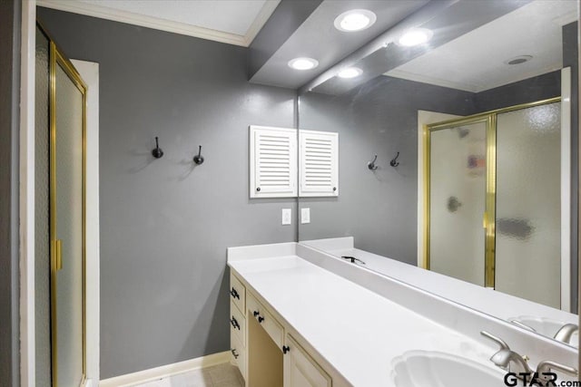 1216 Kingspark Dr, Tyler, TX 75703 - bathroom with baseboards, a shower stall, vanity, ornamental molding, and recessed lighting
